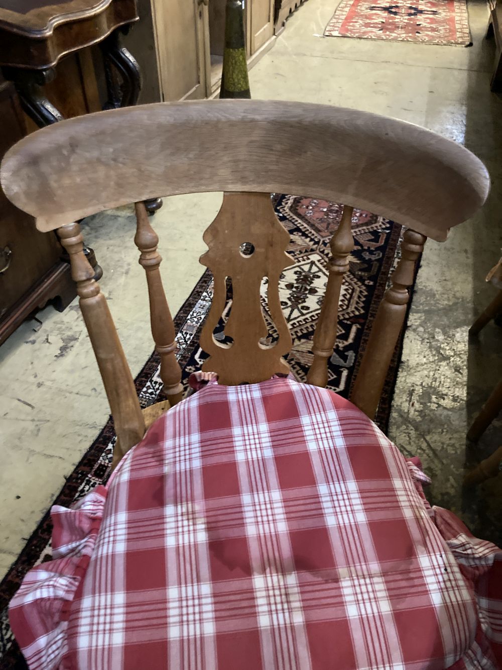 Two Victorian elm and beech smokers bow elbow chairs together with six Windsor kitchen chairs